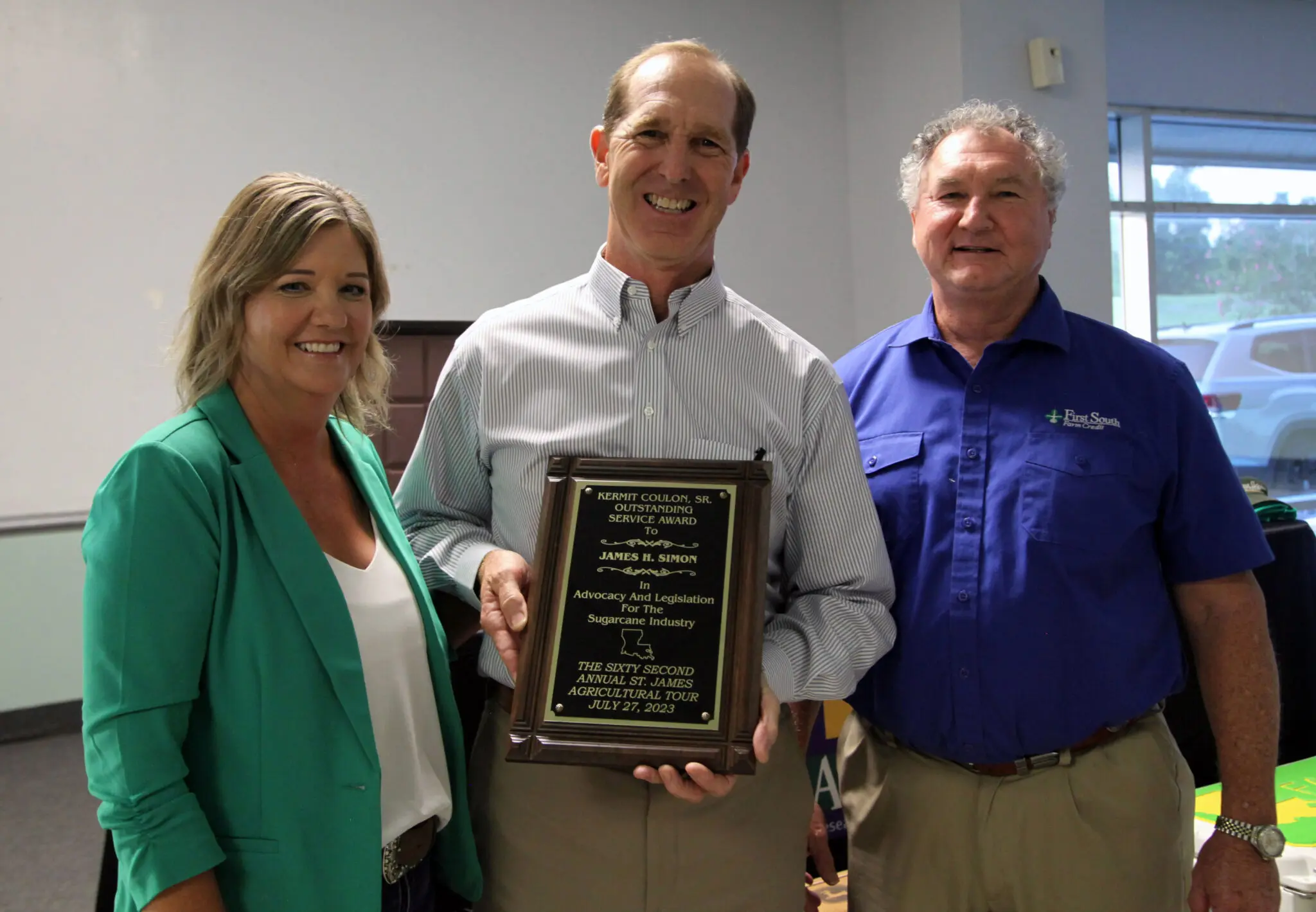 Simon honored with Coulon Service Award at St. James banquet